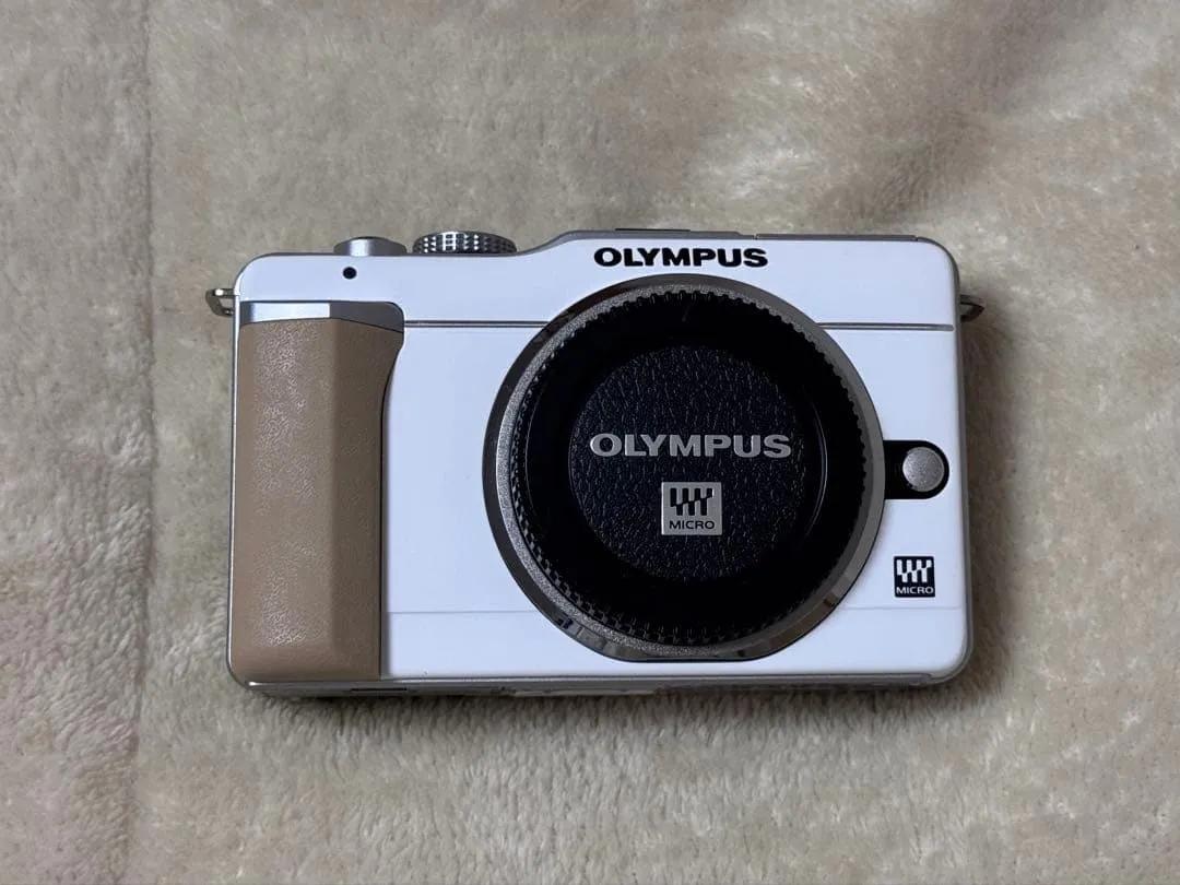 Máy ảnh phản chiếu ống kính đơn không gương lật olympus pen e-pl1s - Ảnh 2
