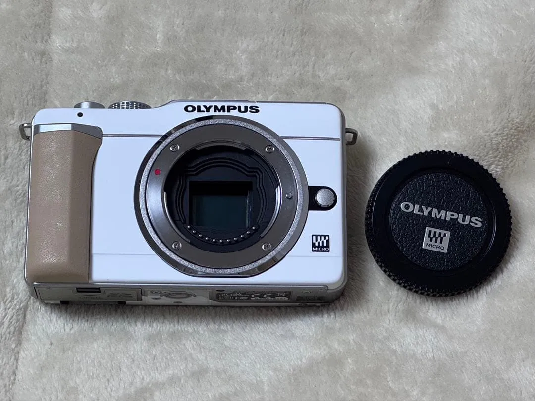 Máy ảnh phản chiếu ống kính đơn không gương lật olympus pen e-pl1s - Ảnh 3
